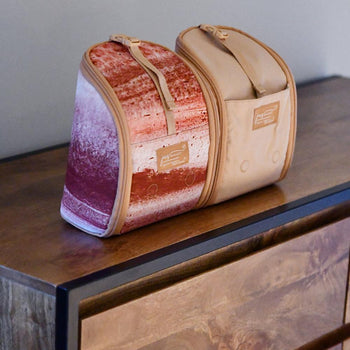 organise pod blush with baby on mat