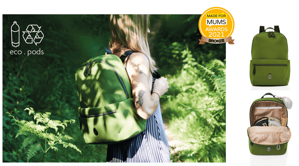 green neoprene baby changing bag with removeable pods to keep you organised