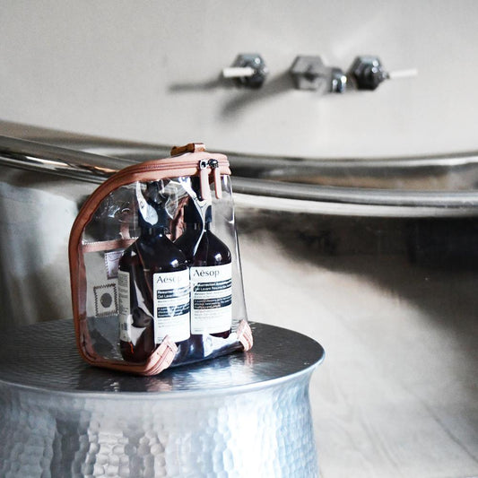 lifestyle view of clear pod on side of bath