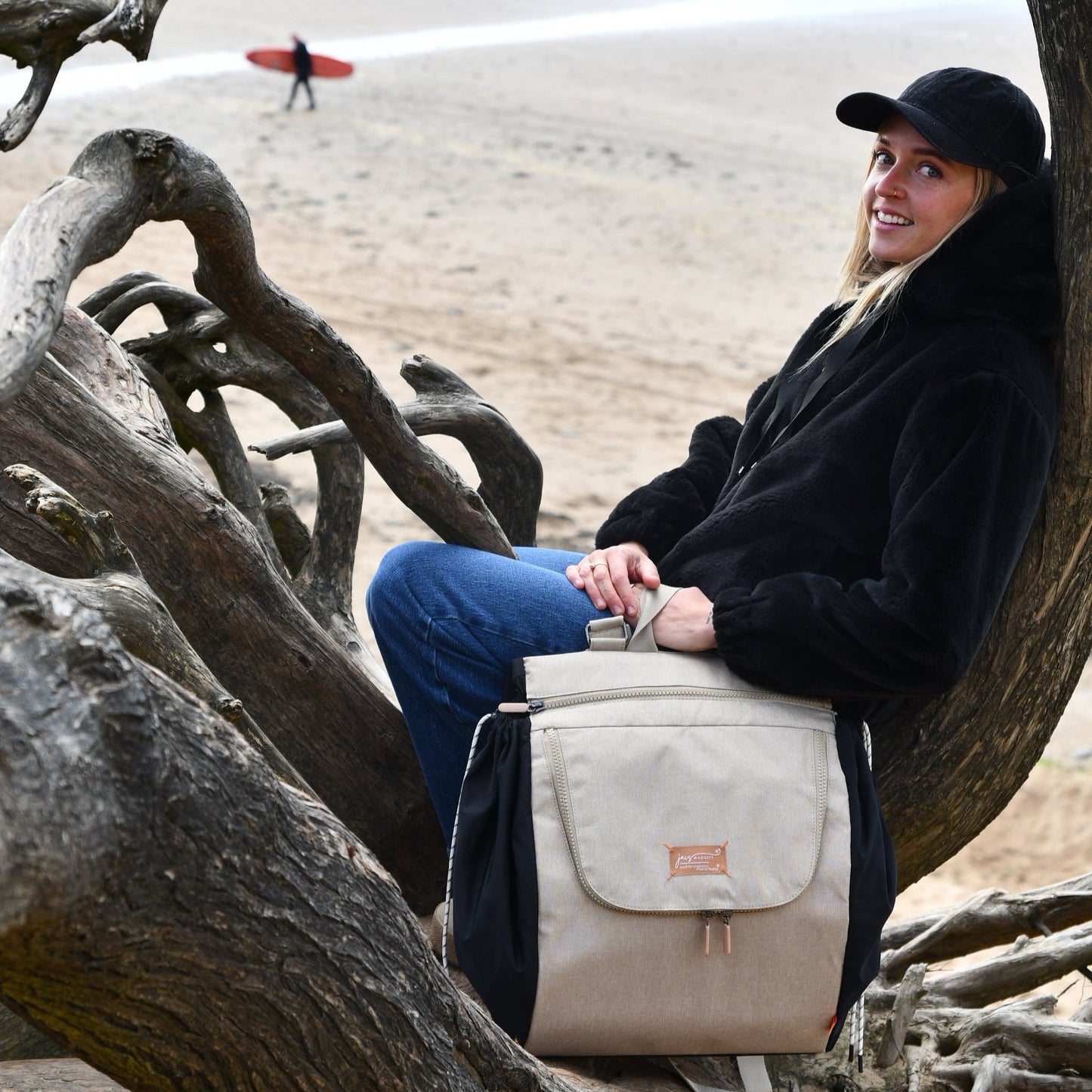 jacapod backpack at beach with surfer