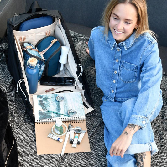 art bag jacapod with painting contents