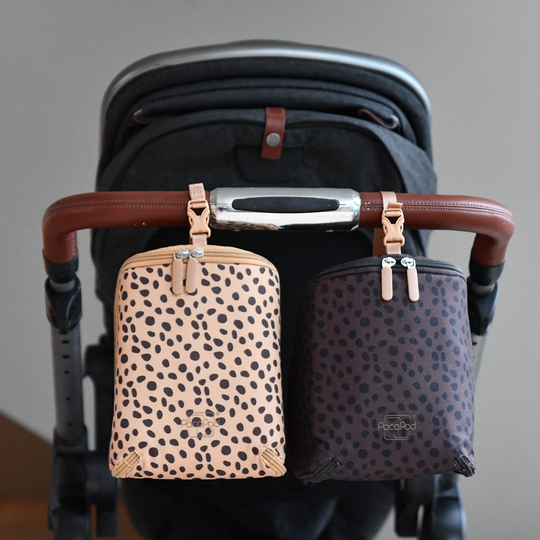 pods on pram handle baby changing bag
