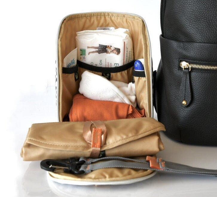 inner view of the baby changing bag showing the pocket system and labelling