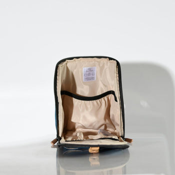 organise pod blush with baby on mat