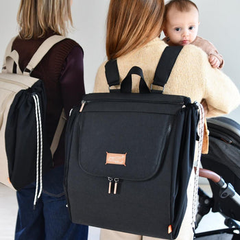 baby on shoulder with pacapod baby changing bag
