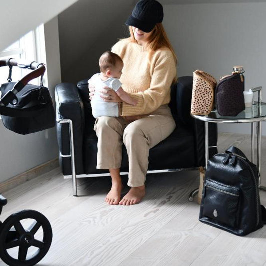 baby and mum with hartland croc and pods baby changing bag