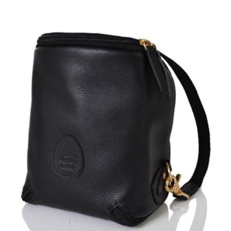 Front image of the Freedom Pod leather in black zipped up with part of the backpack strap showing