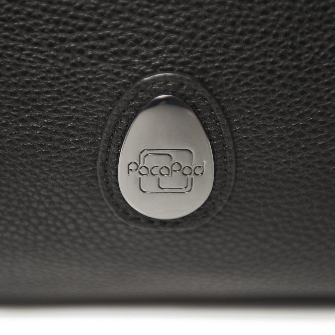Detail image of the PacaPod metal branding on the Firenze pack