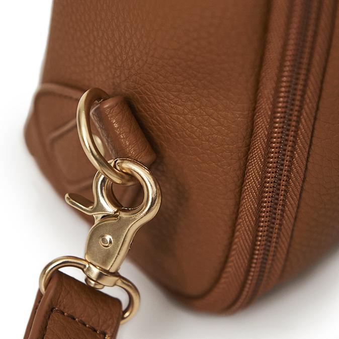 Close up of the strap clip gold hardware