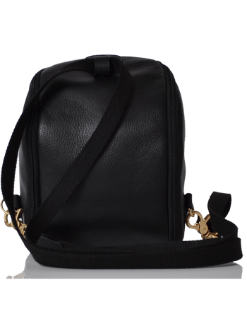 Woman wearing the freedom pod black on her back while outdoors