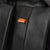 Hastings Knapsack changing bag with the feeder pod, changer pod, mat and pram clips beside it with a white background