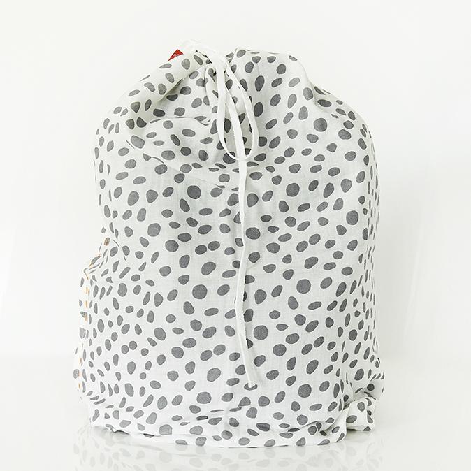 Bamboo muslin used as a baby bag with drawstring cord