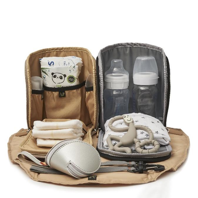 Open image of the changer pod and feeder pod filled with relevant items as packing suggestion