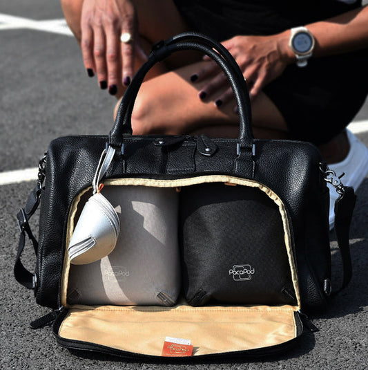 baby changing bag showing the cargo system and two pods inside for organisation