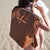 Front image of the Saunton Pack Oak showing the top of the straps behind